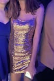 I was honestly worried about this dress because I ordered it without trying it on but it was PERFECT. I'm a very petite tall girl and I didn't find it to be too short or like ride up or anything while I was walking. It's so pretty and I got so many compliments. It has an underlayer that makes the dress comfy so it's not like you're itching because of the sequins the whole time that you're wearing it. I would totally recommend this dress! - Adeline W.