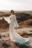 I was looking for a long sleeve dress for an October wedding. In my country there are no long sleeve dresses. I especially wanted the boho, lace look and the trumpet sleeves. I ordered the dress, hesitating between M and L. Since I am in Europe I got the bigger one, in case I needed to alter it, as I was 154 pounds at the time. Fit snug and very comfortable. By the time of the wedding, as many other brides I lost 3 pounds, so M would have been enough, but L is still fine on the pictures. The quality is great, again, the most comfortable dress of all the salon ones I tried and amazing cut for those who are stronger in the belly area. I just love it and I am extremely happy with my look. If you are going for the boho wedding dress, this is the dress for you! - Odsolya T.
