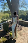 Wore this as a bridesmaid and really liked it. The material is very pretty and flowy, and the color worked well against my skin tone. The straps were pretty long but they were adjustable. This dress is definitely on the LONG side though, I am pretty tall and the only reason I wasn't tripping over the length was because I was in 3-inch heels. - Pooja V.
