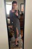 The fabric does not give, but it was very comfortable, a bit snug getting on. My measurements are 27.5-28, usually wear a 4/small, but some mediums as well. If I was even a teeny bit wider in the bust, it probably would not have fit. The medium would have been too large. It looks much better snug/form-fitting in the bust/waist. I would recommend a short slip so it doesn't cling. - Caitlin S.