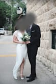 I had to sew a little flower decoration in the front to add in some detail. Had to get it hemmed, and I closed the slit on the front by a few inches. Amazing quality, so happy I got it! - Tena P.