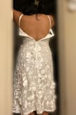 This was my first choice dress. It was so beautiful, and I loved the flowers popping out. The design was so pretty and unique. Unfortunately, it didn't fit my upper body. I tried zipping it up, but my bust or ribs were too big. The lower part did fit perfectly. I would've ordered a bigger size, but they didn't have any at the time. I returned the dress and kept the other one I ordered instead. I would recommend getting a bigger size or simply getting a different dress if your bust is bigger than mine. - Jess G.