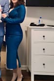 The dress fit well on my postpartum new body. It adjusted to my curvy body but was not showing too much. I'm a short person, but I didn't have to adjust the length. Sleeves were slightly long, but I didn't adjust them. - Danielle M.