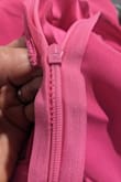 It's beautiful but the zipper is sewn into the dress so I cannot even zip it down but halfway. - Lucia R.