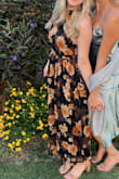 I agree with the other reviews that the zipper gets easily stuck. The middle section was tight on me (unzipped during the meal) but going a size up probably would have made the top half too big. If you have a short torso you may have an issue with the top half of the dress. But I got tons of compliments and love how it looks in photos! - Emily J.