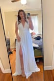 Very surprised at the quality of the dress, ordering online for me has always been hit or miss. But this dress is great!  A little bit up top but I have a smaller bust, so I will have to get it taken in a bit but other than that, it fits nicely!  Happy with my purchase. - Caitlin C.