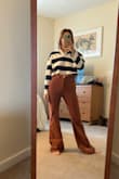 These pants are super cool! I love the color and the overall shape of the pants. However, I find that they're a bit snug around the waist and super long (for me). It's hard to say whether to size up or not, but I feel like I would have liked to see the next size up if this wasn't final sale. I tend to go between 24/25 with pants for reference. - Halley M.