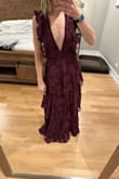I love this dress and therefore I have gone through the ringer to get it to fit. I bought the XS (my normal size) and it was a circus tent. Even the tailor wouldn't take my money. They said I'd be better off returning it. So I did and I ordered the XXS which is ALSO a tent! It's beautiful and unique so I'm having my MIL attempt to tailor it to an appropriate size. I love Lulus and I've never had this issue before, but this dress is an absolute fail. The photo is of me in the XXS. On the model it's midi length, on me it's a maxi++. The neckline is at my belly button. Anyways, all to say the dimensions of this dress are extremely off. - Stacey O.