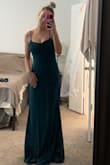 I loved this dress. It was the perfect length, and the material of the dress was great quality. The dress comes with built-in padding, so it was a huge plus that I didn't have to find a bra to go with it. This dress was comfortable and great for a formal wedding! - Brooke K.
