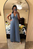 I really liked this jumpsuit. It was perfect for the wedding I wore it for. It had a little more sideboob than I would have liked, but I was able to tape it up a bit. It was also slightly loose, but going down a size would have been too small. - Briana W.