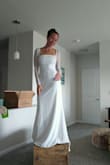 The sleeves are not too tight. It fits perfectly in the bust but the hips are a little looser than I wanted, though  I think that's the style. I may want to take it in a bit for my wedding. - Karie J.