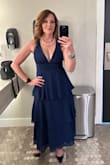 A very pretty dress that felt fabulous on. A bit tight around the rib cage, but not uncomfortable. It was perfect for an outdoor fall wedding with a lot of dancing. I'm 57 years old. - Gina L.