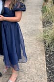 I love this dress! I ordered this for a wedding and came in just in time. I wore a medium but probably could have done with a small. The tie is adjustable so it fits but the elastic on the back was loose! I love it overall! - Sophia S.