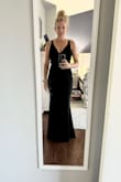 I ordered several dresses to try on for a few black tie events. This was my husband's favorite. It's true to size but very form-fitting and I didn't end up choosing it because I felt it wouldn't be as flattering if I ate a big dinner. However, didn't need a bra and it held everything in place nicely. Think I would have been comfortable all night without one and I'm a C-cup and typically need a bra. - Katie S.