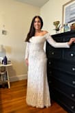 I wasn't convinced this was the one even though friends said otherwise. After ordering it twice and returning it, I purchased it a final time and was very happy. The lace is soft, it comes to the perfect length on me with three-inch heels. It's a little longer in the back and looks great.

This is my second marriage, I'm 55, and I will be wearing shapewear. We're marrying at City Hall with a family lunch afterward. In the photos I've attached I'm not wearing shapewear. - Christina V.
