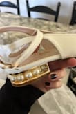 Shoes were fine other than the there was a bead missing from the heel. - Casey R.