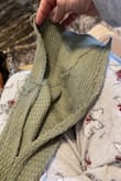 I bought this sweater and it is absolutely beautiful. The material is nice and fits true to size and fits really well however the very first time I wore it the sleeve started unraveling. So I basically I got one wear out of it. Very disappointed. - Odette S.