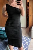 Reviews are right, runs small. I ordered an S thinking "this will definitely be too tight," but it fit great! I have a really small chest, so the stretchy fabric is great because it doesn't gap. - Claudia Y.