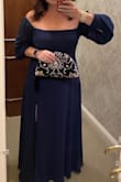 This gown fit perfectly except for the length. I needed a few inches hemmed. It is comfortable and flattering. I received many compliments. - Mary B.