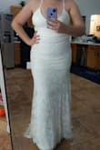 Very pretty dress, fit well, and is comfortable. Good proportions for hourglass figure. Ultimately returned because I felt it looked more sundress than formal for a wedding, but that's a personal preference! - Jaclyn O.