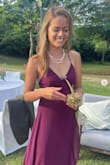 The actual dress arrived more purple than what was advertised, but it was still a matching colour. It fit me perfectly, but the dress itself was a little too long and dragged on the floor a bit; so make sure to wear really high heels if you're under 5'5. - Vanessa S.