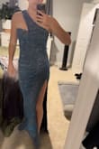 This dress is so cute and sparkly!! Unfortunately, the sparkles shed really bad. But I think, once it's been worn for awhile, the shedding would slow down. - Amy M.