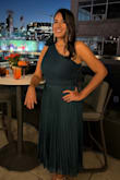I received many compliments thanks to my dress. It fit me perfect, the size L. (First I bought an M size, but it didn't fit me so please check the measures because this dress doesn't expand at all). Elegant, fresh, and soft. I loved the dress and [beautiful color]. Apparently, everyone at the party thought the same. - Norma C.