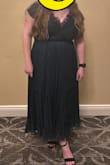 I absolutely fell in love with this dress when I was searching for something to wear for a work gala. When I first tried it on, the fit was fine, but as some other reviews said, there was VERY little coverage and support for my girls. Other than that the fit was great, no trouble getting it zipped (I ordered an XL as recommended). I loved the dress so much, I was determined to make it work. I had my sister stitch the top area so the material was more closed at the top. I was still very uncomfortable with how much boob was showing, so we bought a piece of lace and sewed that along the neckline for more coverage. I took off a star because of the alterations I had to make, but overall I loved this dress and got lots of compliments! - Delaney J.