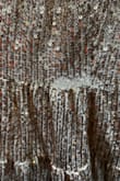 The dress was absolutely beautiful. It was so fun and comfortable. However, I only got to wear it once because the sequins came off in sections. Now there are gaps in the fabric with patches of missing sequins. - Virginia K.