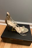 The heels fit true to size and look cheap compared to the picture. - Ashley W.