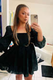 This dress is PERFECT for a fall event! I wore this to a wedding, paired with some ankle white cowgirl boots. Chef's kiss! For me, this dress ran a bit large. The site suggested an XL but was way too big. Exchanged it for a large. Honestly, I probably could have even got a medium, and it would fit even better! There are no zippers to mess with, just a nice elastic back and bow; tie to your liking. The only issue I had with this dress were the sleeves. They don't really stay on your shoulders very well. I had to constantly fix them. But other than that, it was super cute! - Nichole M.