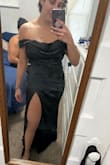If this dress had fit better it would have been a perfect fit. So comfortable but I should have sized up to an XL. The slit was also higher than expected but still comfy & sexy. Super bummed this didn't fit as expected. - Carolina P.