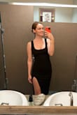 Got so many compliments on this dress! Material is very flattering, and I will definitely wear it again. It was slightly shorter on me than in the photo. I'm 5'7" and got a small. - Delaney M.