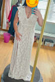 I love this dress. It fits great, and the lace is beautiful. It's a VERY deep V, and it looks great on the model, but girls with big chest BEWARE. I have full 36DD, and my boobs were about to fall out. I mean, the girls look great but not for my wedding. No biggie, I went to a seamstress, and she said no problem. I have a short torso, something I can't change. The picture shows how my seamstress lifts up the dress. I will add more pictures after my wedding. The ladies at the shop said it was a very elegant and gorgeous dress. It's true to fit. Will be ordering more from this company. - Jazmin A.