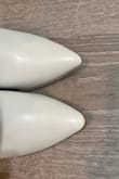 The toes of my boots look like they came from a totally different design (one pointed, the other rounded). There is also a spot on one boot that looks like an ink mark that was wiped off. I needed these for a wedding the day after they arrived, so I wasn't able to return or exchange. - Heather L.