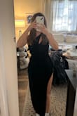 I wanted to love this dress, the quality is nice and thick and stretchy, and for the most part, it hugged my body really nicely. I ended up returning it for two reasons: one being that the slit was way too high for me, making it not appropriate for the event I wanted to wear it to, and as noted by other reviews, there's a weird flap of extra fabric around the slit area which kind of just hangs there. You can't really see it in the stock photo. My second photo shows this. - Micaela K.