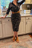 Very soft and warm. I love the way it pulls in at the waist. The tiny button holes were almost too small for the buttons though but just have to keep at them. I paired it with a wide brown belt and a fall felt hat. I did have to reorder in one size down because the size suggested was too loose - Becky C.