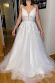 Beautiful dress! Downside is the material used for the straps is super scratchy and uncomfortable, which carried into the bodice too but wasn't as uncomfortable as the straps. Comfort is a huge thing for me in my wedding dress, so if they fixed that, it'd be a 5 star dress. Decent quality otherwise and a very pretty dress. - Mandy B.