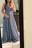 I'm petite, and the dress was very large. But the dress is beautiful - Camila R.