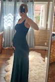 I ordered this dress last minute as a bridesmaid option, and I loved it. I was 20 weeks pregnant at the time, and it covered my bump perfectly. Wore the small, and it was comfortable, classy, and only needed to be hemmed slightly. - Caroline D.