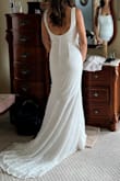 Wanted something simple but classy for our micro wedding. This dress was perfect and at a great price. Had to get it hemmed. Ordered a small and medium and kept the small. I'm a 32DD and it fit a little loose in the bust but I lost a little weight by our wedding date so that was probably why. I probably should have gotten the straps tightened when I got it hemmed but was still happy with the dress and how it looked overall. - Vanessa J.
