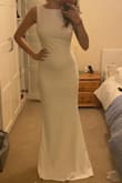 Bought this dress for a wedding dress. May wear it for an evening dress or for the hen party. It is a very flattering fit. I am normally a UK size 6. After the wedding, I'm tempted to dye it so that I can wear it more than once. - Ella B.