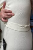I paid for overnight shipping to get in time for my rehearsal dinner. I had to wear it because I had no other choice. Luckily, I had my sister to walk behind me as one of the holes was directly on my bum. Really soft and pretty but unfortunately am stuck with it as I did wear it. - Tiffany F.