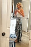 At 5'2", it's slightly longer than I would like in the back, but overall great quality and very flattering for a small waist! - Maggie M.