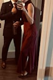I would absolutely recommend this dress! I wore it to a fall black tie wedding and received multiple compliments on it! The silhouette of the dress is elegant and has a vintage vibe to it, which I loved! I would say it fit a little big in the neck area, and the slots weren't on the side like I thought. However, I wouldn't keep myself from buying this dress even knowing this information! I just pinned the top of the dress, and the slits looked beautiful walking and dancing! - Ashley B.