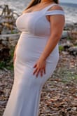 This dress was perfect for my elopement. It fit very well and look great. The only reason that I gave it 4 stars was because the zipper was not the best quality which made it difficult to work with, and the top layer of fabric was on the thinner side, making it very easy to see the thick seams that were on the layer underneath. In my case, since I have a larger chest, it was very noticeable since the seams for the two layers did not always match up on the top and were easily visible since that's where it stretched the most. Still really enjoyed the dress and appreciated how comfortable the fabric was, and the mild stretch that it had - Cristina G.
