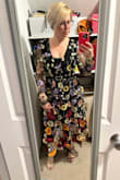 I bought this for a special evening out in Chicago in November, so wanted something warm. I love that this has sleeves but they are sheer so this could easily be used year round. I'm short (5'3") and the length hits around mid-calf. The bust on the M fits well but the waist is a little loose (I plan to wear a belt to accommodate). The S fit perfectly in the waist but was too tight in the bust (I'm a size 6/8 and a 34DD for reference). The V is too low for my taste, my girls were on full display, so I will wear a black cami underneath. I love that this can be made more elegant with strappy heels and a belt, or a bit more grunge with a leather jacket and boots. The flowers are gorgeous and have so many colors to pair accessories with. Unfortunately, some of the flowers droop so I will pin them so they stay up. Overall a great piece to have in my wardrobe! - Melanie T.