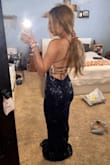 So, I'm a very small girl with a very small chest. I don't have much shape to my body and it's pretty much straight and my legs are very skinny but I don't have a super flat stomach. I have a small gut. I think this dress flatters me very well as it would a lot of people. My chest is so small though that even an XXS is a tad bit big for it but I may just have to tighten it a bit more. It definitely shows and flatters the girls a lot so be wary of any nip slips. I got the blue for a marine core ball but really wanted the red but it's sold out :( Also, I preferred the green but the blue goes much better with this event. Also, one other thing I wish it was satin and more sequins like the satin underneath the mesh but either way, it's definitely beautiful. I'm just picky but I LOVE the back. If you are my height, heels will easily fix the length. If you like long dresses but not too long this is perfect. I find the length pretty but I feel that I may be stepping on it a lot. - Makleah T.