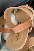 I wanted to like this sandal. But unfortunately, I would not recommend it. 
The front cross strap was super loose! Not a good fit at all. It's so strange how loose it is. See the photo below. The strap is too short to even strap in properly! It looks like it was cut short or made wrong. Totally bummed. - Lokelani N.