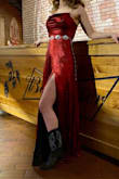 The material is soft and it's not thin either. It has a pretty metallic look to the red that has unique and adjustable straps. - Amy D.
